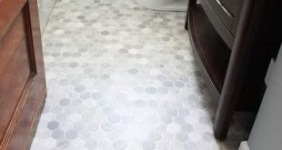 How to Install a Sheet Vinyl Floor | Gray tile bathroom floor .