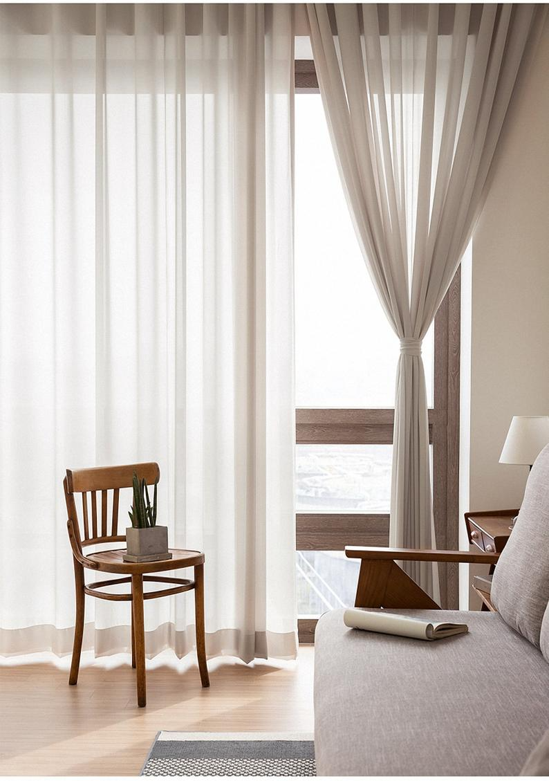 Dress your windows with lace lined or
translucent voile curtains