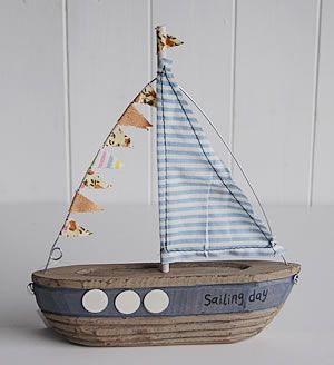 A small decorative wooden boat - The White Lighthouse | Boat decor .